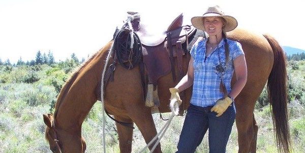 Jessica standing next to a horse working on the Mt. Shata Wild Range