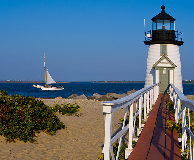 Cape Cod Massachusetts Lighthouse and Saillboat